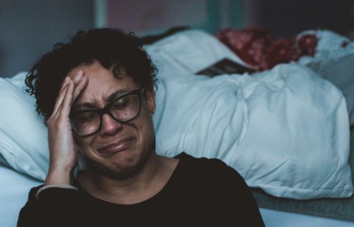 Sad, depressed woman crying