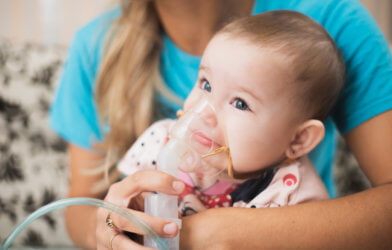 Baby given inhaler or spacer for respiratory condition